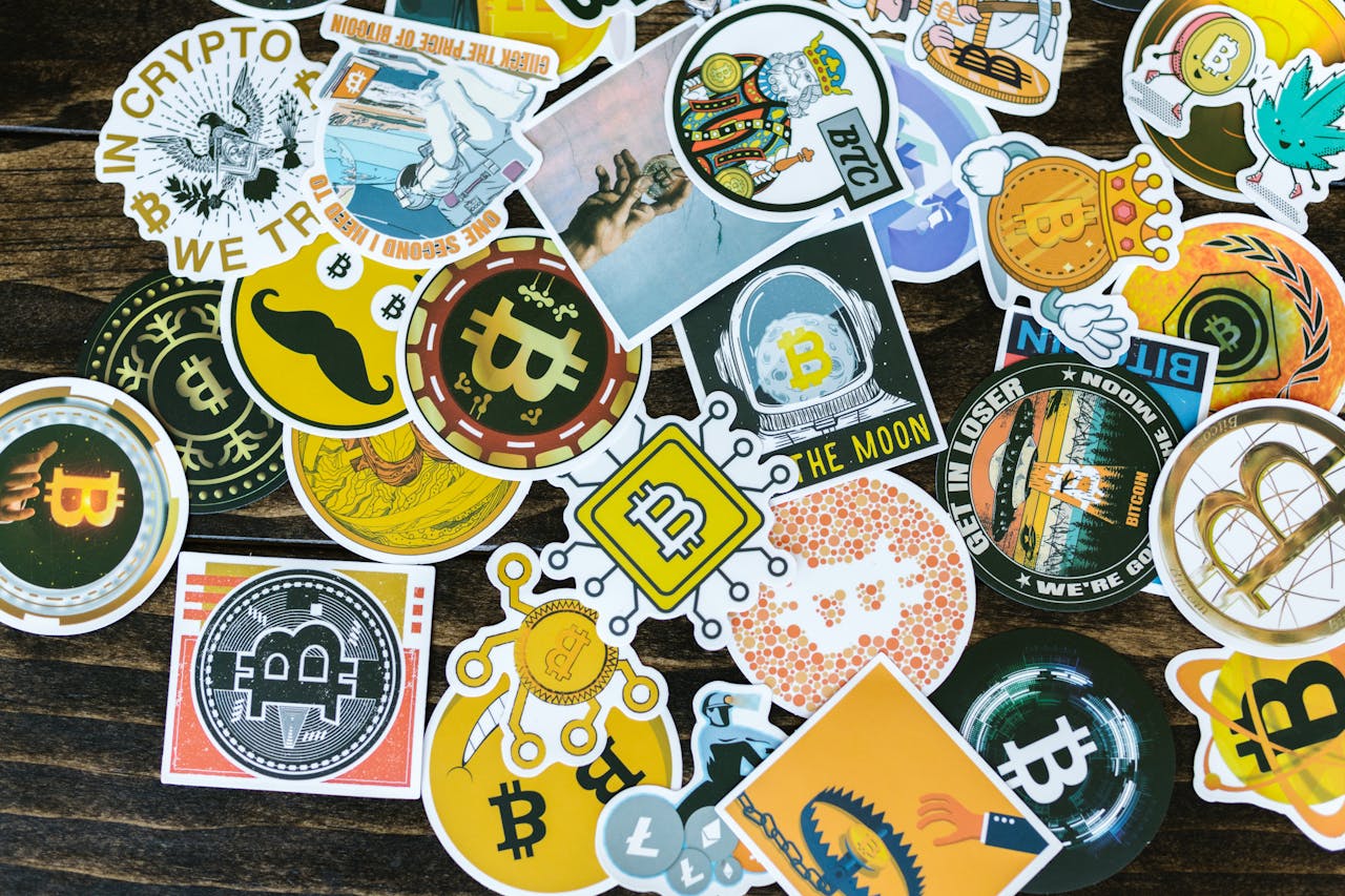 gallery-1 Colorful collection of Bitcoin-themed stickers on a wooden background, ideal for cryptocurrency concepts.